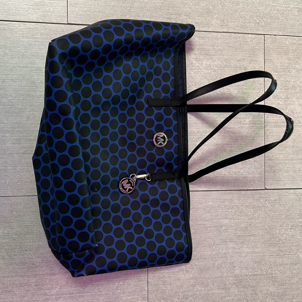 Medium large older, Michael Kors, blue and black polkadotted tote bag